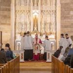 Bishop Tobin Installs Father Romanoski as Pastor